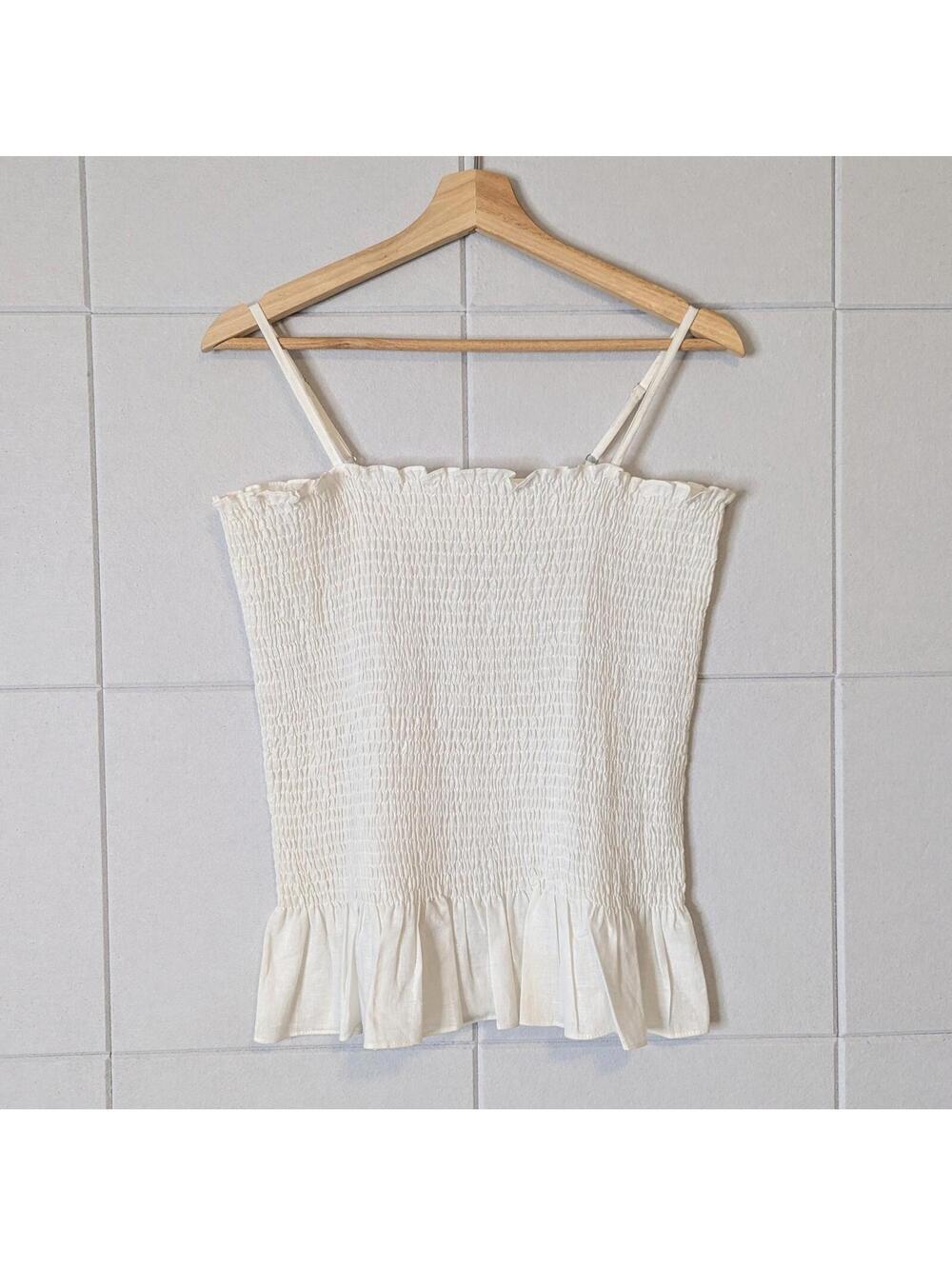Anthropologie Maeve linen & cotton smocked peplum cami top